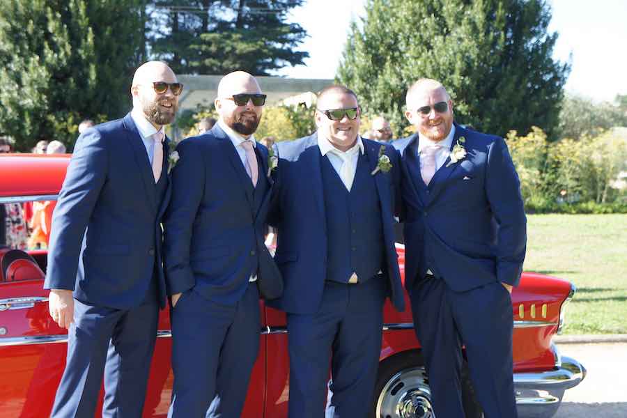 Team Groom at an outdoor wedding ceremony
